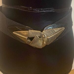 Omegh stretch belt.  Black with gold.size Large